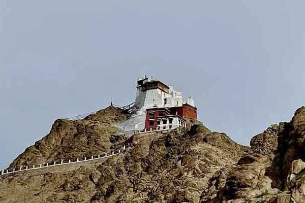 Leh Palace exterior against blue sky